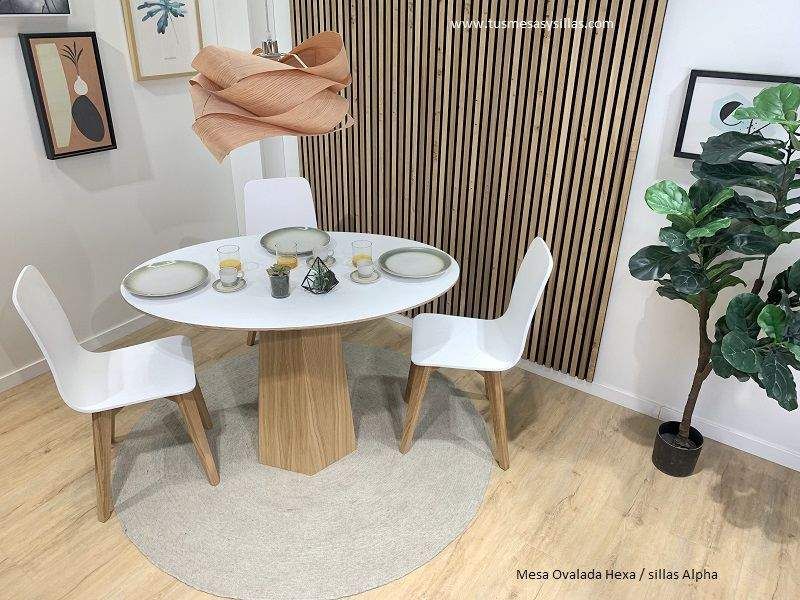 grandes tables à manger ovales allongées avec base centrale en bois