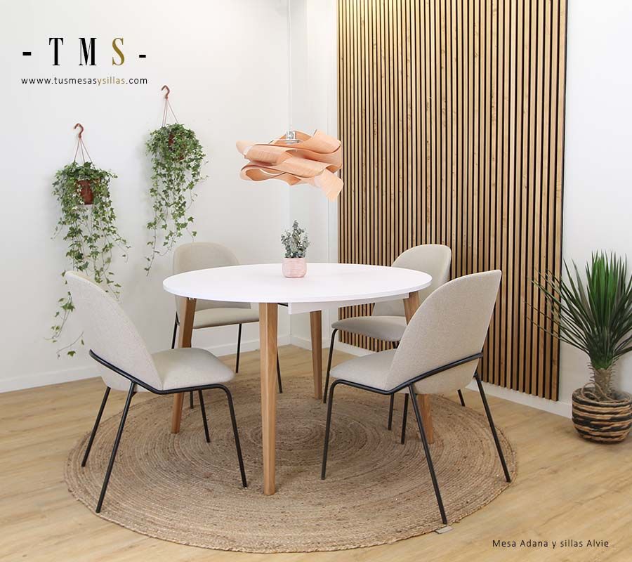 Mesa-redonda-de-comedor-encimera-lacada-en-blanco-y-patas-en-madera-maciza