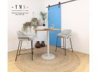 tabouret haut recouvert de tissu gris clair