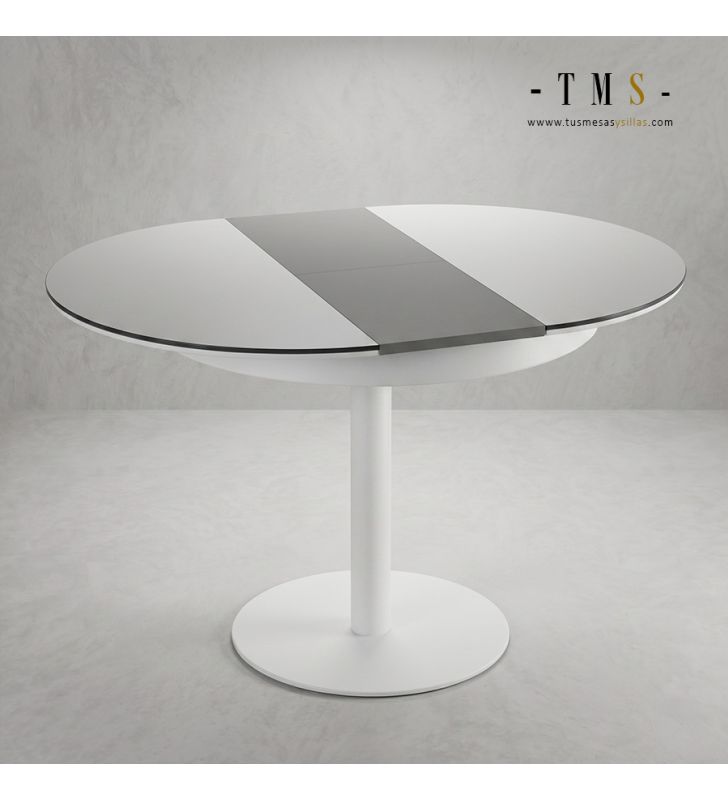 Table d'un diamètre de 90 cm et d'une extension de 35 cm. Table d'un diamètre de 90 cm et d'une extension de 35 cm.