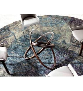 Mesa redonda de comedor en Nogal y encimera de cristal